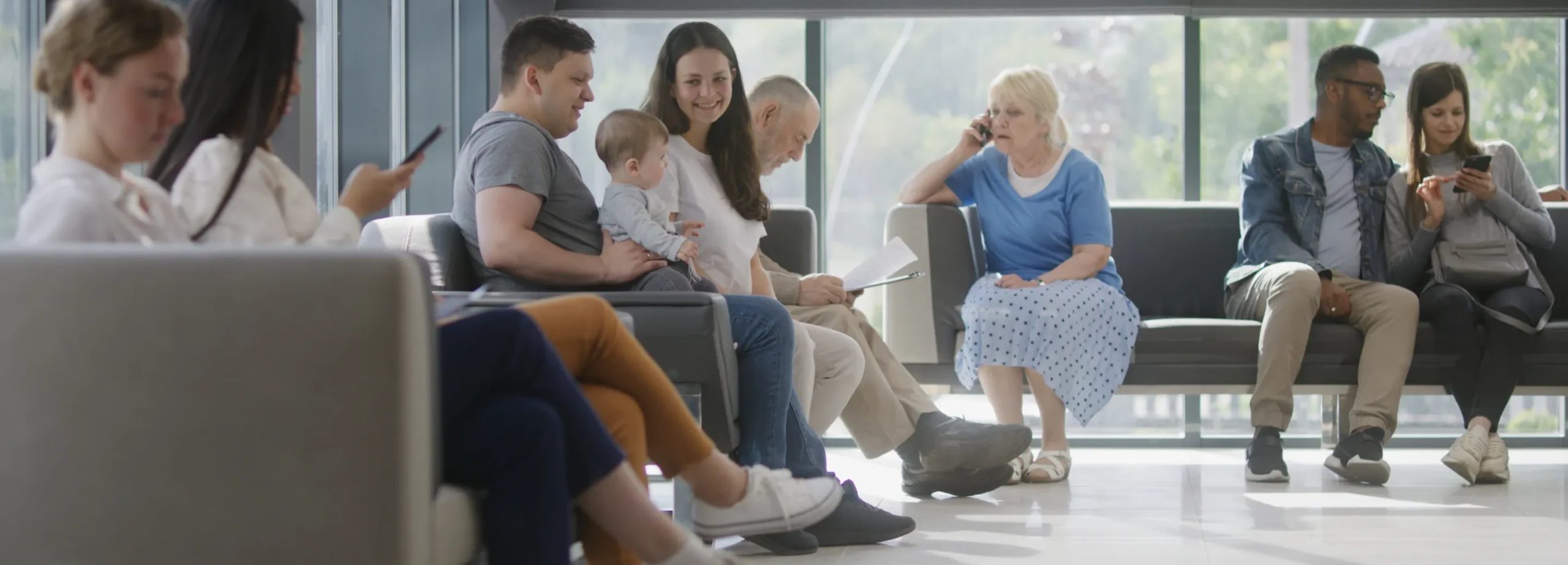 Patients in a healthcare waiting room representing strategic growth planning, patient demand forecasting, and practice expansion